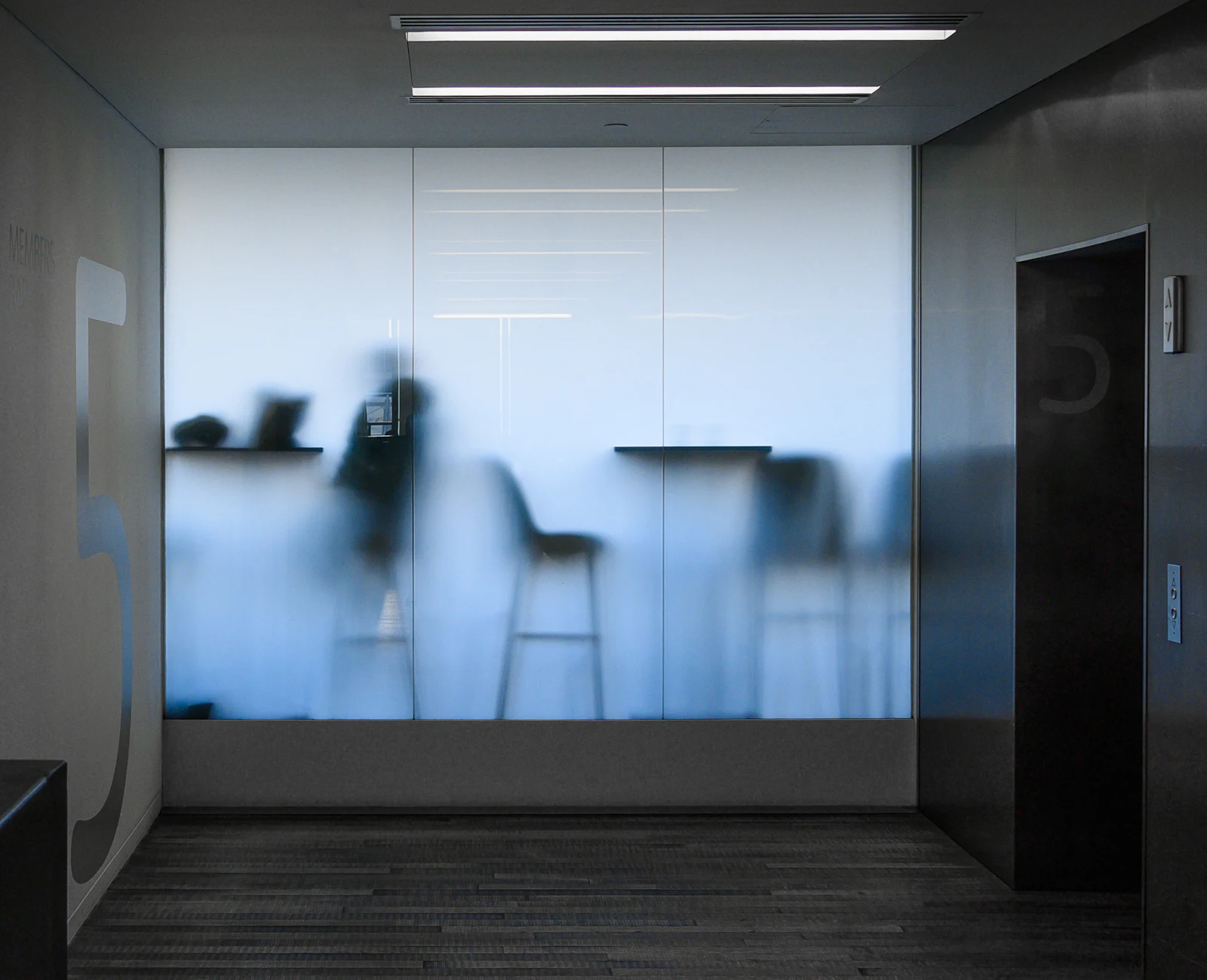 Team moving through a modern workspace